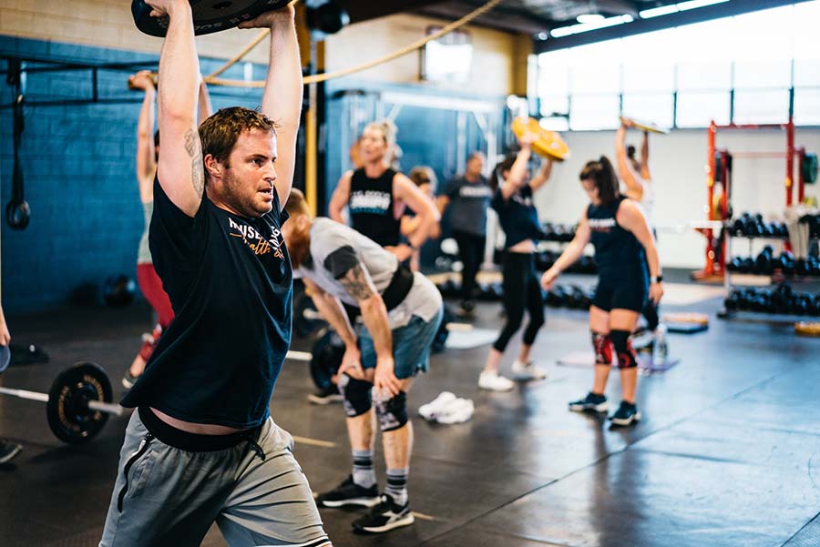 House of Training Whangarei-gym-person lifting weights